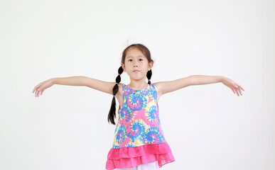 Asian little kid girl with pigtail hair standing and open wide arms with looking camera isolated on white