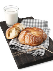 food photography of homemade sweet bun for breakfast side view. Baked bun made of yeast dough in a rustic style on white background close up