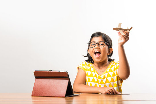 Cute Little Indian Girl Making Paper Plane, Aeroplane For Science Project With Online Tutorial