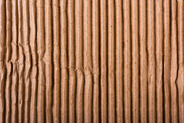 Corrugated brown cardboard sheet of paper texture or background flat lay, Folded recycle carton paper box