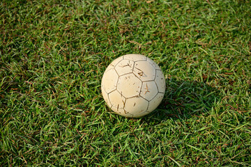 Close-up of soccer ball on soccer field 
