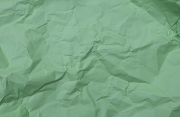 Crumpled green color background texture