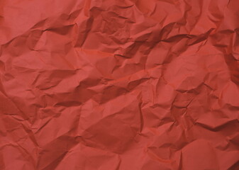 Fototapeta premium Crumpled red color background texture