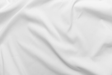 Abstract white fabric texture background. Cloth soft wave. Creases of satin. silk and cotton.	