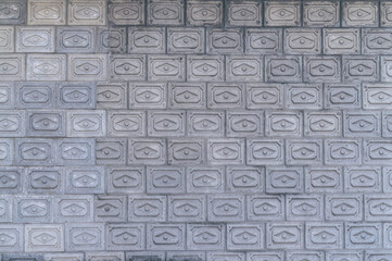 Gray grunge tiled wall background