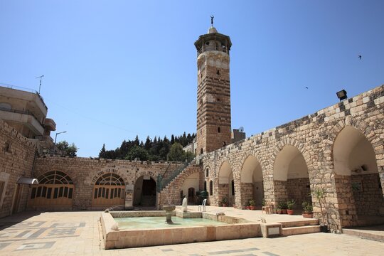 El Nuri Mosque is located on the banks of the Asi River. It is also known as Nureddin Zengi Mosque. The mosque was built in 1172. Hama, Syria.