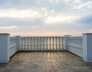 Embankment with an observation deck on the black sea coast at sunset.