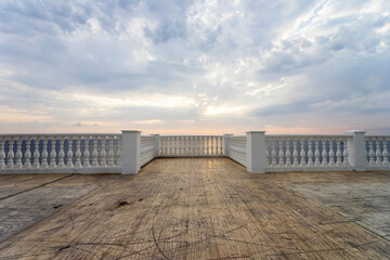 Embankment with an observation deck on the black sea coast at sunset.