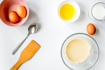 cooking pancake on white background top view ingredients for making