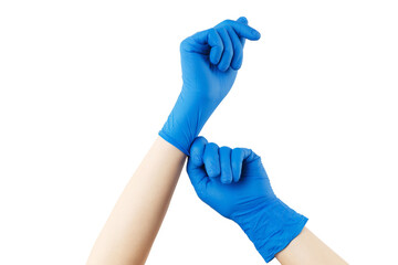 Female is putting on blue medical gloves isolated at white background. Virus pandemic prevertion. Hands protection and healthcare.