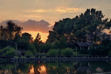 Obraz premium Small wooden church at sunset.