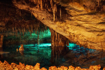 famous dragon caves on Majorka island. Beautiful transparent turquoise water in underground lake,...