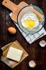cooking pancake on wooden background top view ingredients for making