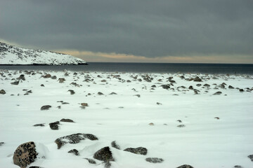 Snow landscape of Barents sea in Russian village Teriberka