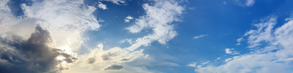 Blue sky panorama with storm cloud on a cloudy day. Beautiful 180 degree panoramic image.