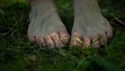 feet in the grass