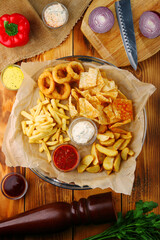 set of beer snacks. appetizers and salty. Pile of food for big company. Party, sport bar, pub, restaurant menu