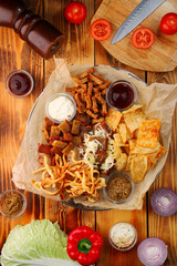 set of beer snacks. appetizers and salty. Pile of food for big company. Party, sport bar, pub, restaurant menu