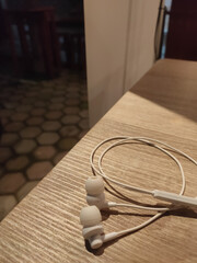 White earphones on the table