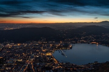Panorama of Como city and Lake Como seen from Brunate after the sunset.