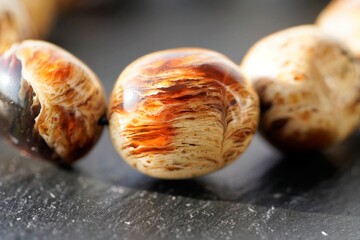 Obraz premium Close up view on brilliant natural rounded amber stones in sun light