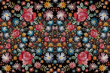 Embroidery seamless pattern with bright colorful flowers. Fashion design. Floral print for fabric.