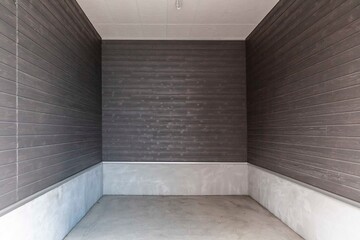 Empty small Parking on the ground floor below the apartment building