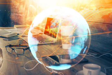 Multi exposure of business theme icons and work space with computer background. Concept of success.