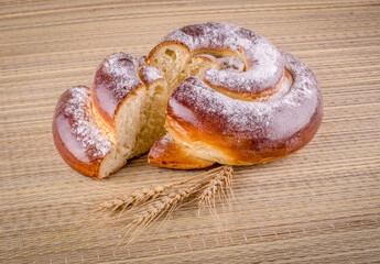 Roll bun cuted bagel with wheat spike - bakery food photo
