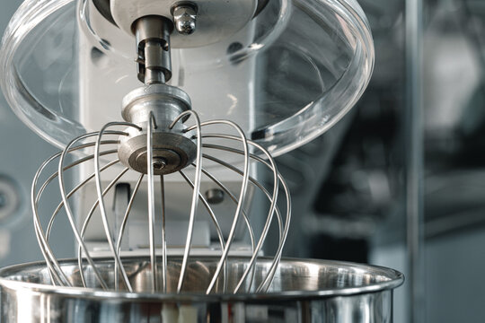 Industrial mixers on shelf in shop close up