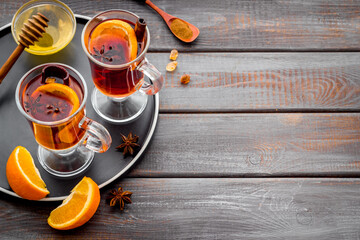 Christmas mulled wine with ingredients and Christmas decoration