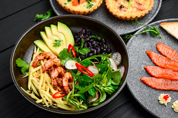 Warm salad with grilled seafood flat lay.