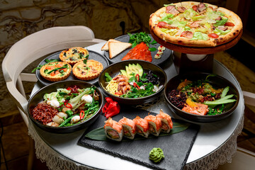 Mixed food, there are different dishes on the table