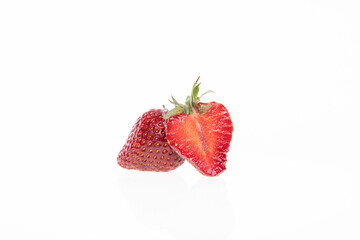 red raw fresh strawberries on white background, close view 