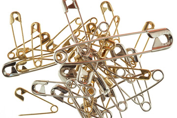 Safety Pins on White Background