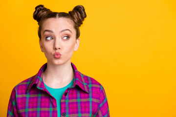 Close-up portrait of her she nice attractive shy funky flirty girl wearing checked shirt sending air kiss copy space isolated over bright vivid shine vibrant yellow color background