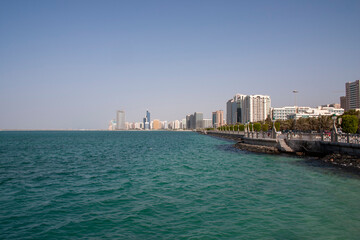 A daytime skyline of the Abu Dhabi Corniche waterfront