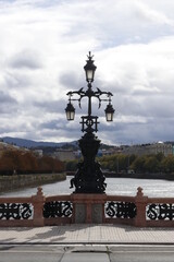 Fototapeta na wymiar Classic lantern on a bridge in San Sebastian