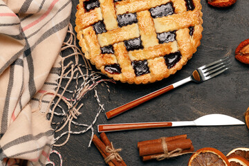 Berry tart pie on black table close up
