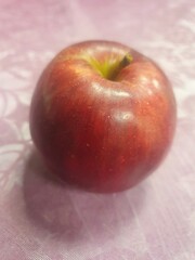 red apples on a wooden table