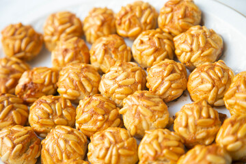 Almond and pine nuts Panellets . Traditional Catalan sweet made with potato, egg, sugar, almonds and pine nuts. Prepares to celebrate Halloween and November 1st