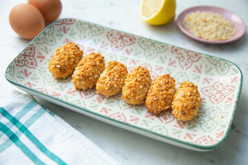 Almond and pine nuts Panellets . Traditional Catalan sweet made with potato, egg, sugar, almonds and pine nuts. Prepares to celebrate Halloween and November 1st