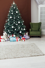 Christmas tree pine with gifts decor brown background 2021 2022