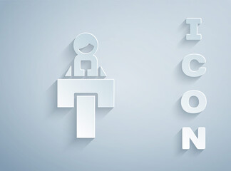 Paper cut Stage stand or debate podium rostrum icon isolated on grey background. Conference speech tribune. Paper art style. Vector.