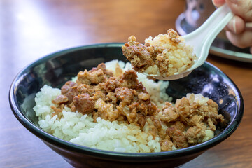 Braised meat over cooked rice, famous and delicious street food in Taiwan.