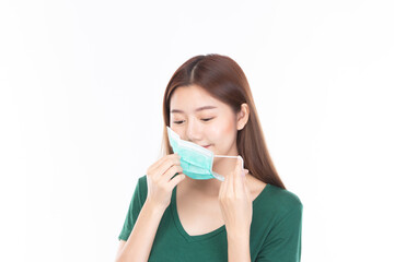Woman wearing face mask protect filter pm2.5 anti pollution, anti smog and viruses. Air pollution, environmental concept on white background.