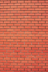 Orange brick wall. Seamless pattern. Textured abstract backgroun