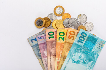 Money from Brazil on a white background, one hundred, fifty, twenty, ten, five and two reais, with...