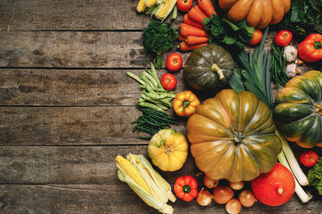 Beautiful arrengament of autumn vegetables on wooden table