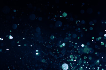 Abstract Blue bokeh defocus glitter blur background.